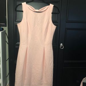 Light pink dress with a bow Accent